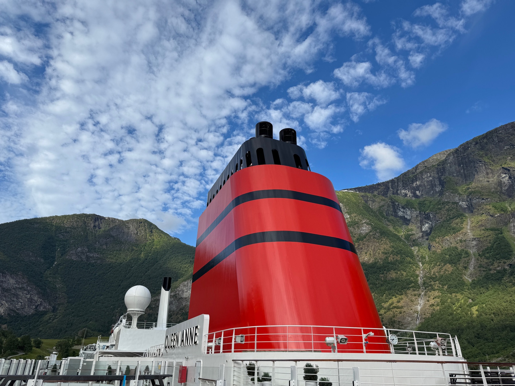 Cruise ship funnel in a Norwegian fjord